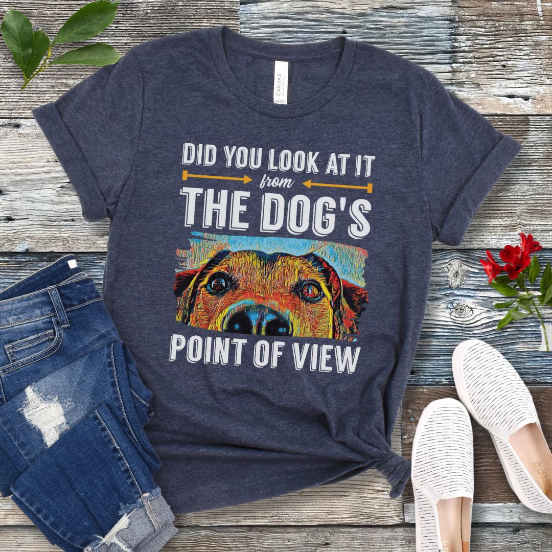 Heather navy dog lover t-shirt with colorful dog face graphic and the text 'Did You Look At It From Your Dog's Point of View', laid flat with jeans and white shoes.