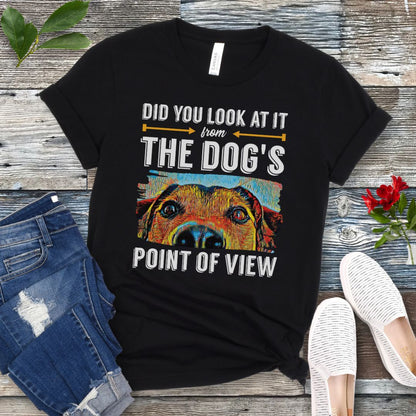 Black dog lover t-shirt with colorful dog face graphic and the text 'Did You Look At It From Your Dog's Point of View', laid flat with jeans and white shoes.