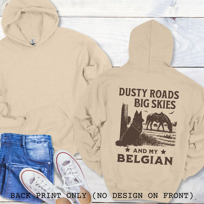 Beige hoodie with 'Dusty Roads Big Skies and My Belgian' text and graphic on a wooden surface.