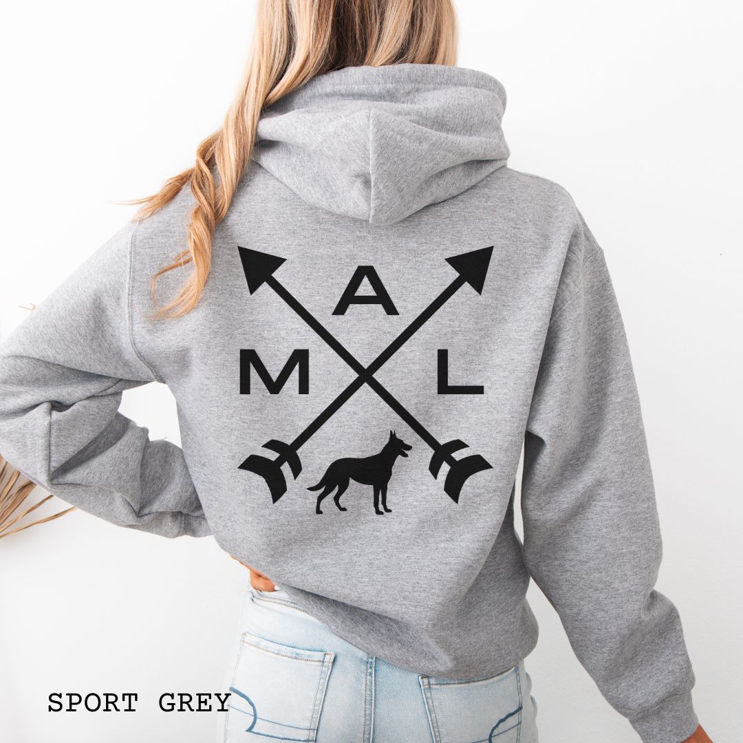 Back view of a grey unisex hoodie with a graphic of crossed arrows, a Belgian Malinois dog, and the text 'MAL', worn by a person.