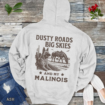 Back view of a light grey Belgian Malinois hoodie featuring a Western-style design with grazing horse, rustic fence, and a Malinois illustration; text reads “Dusty Roads, Big Skies, and My Malinois.”