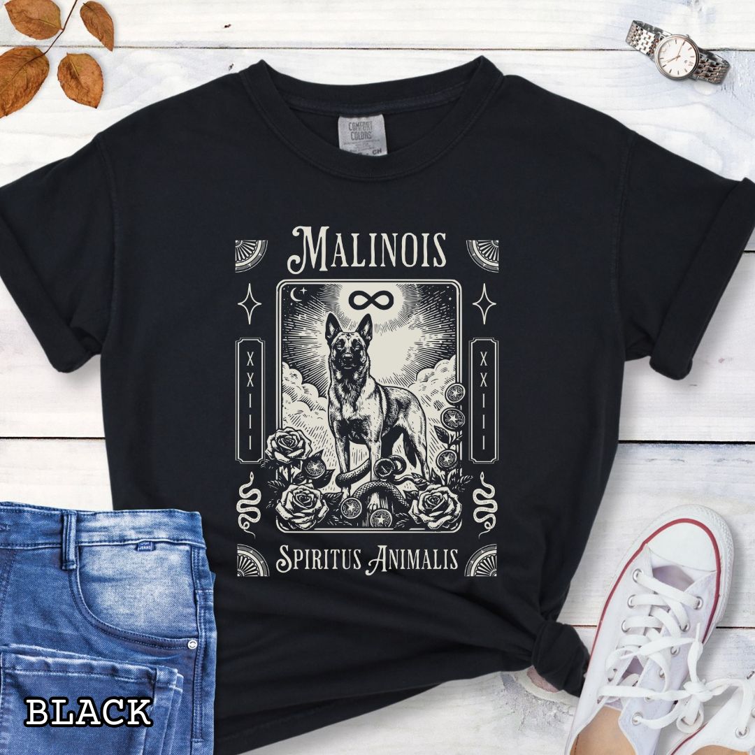 Black Comfort Colors t-shirt featuring a Belgian Malinois tarot card design with Gothic roses and mystical symbols,  and the text 'MALINOIS' and 'SPIRITUS ANIMALIS', perfect for dog lovers and dark aesthetic Malinois fans.