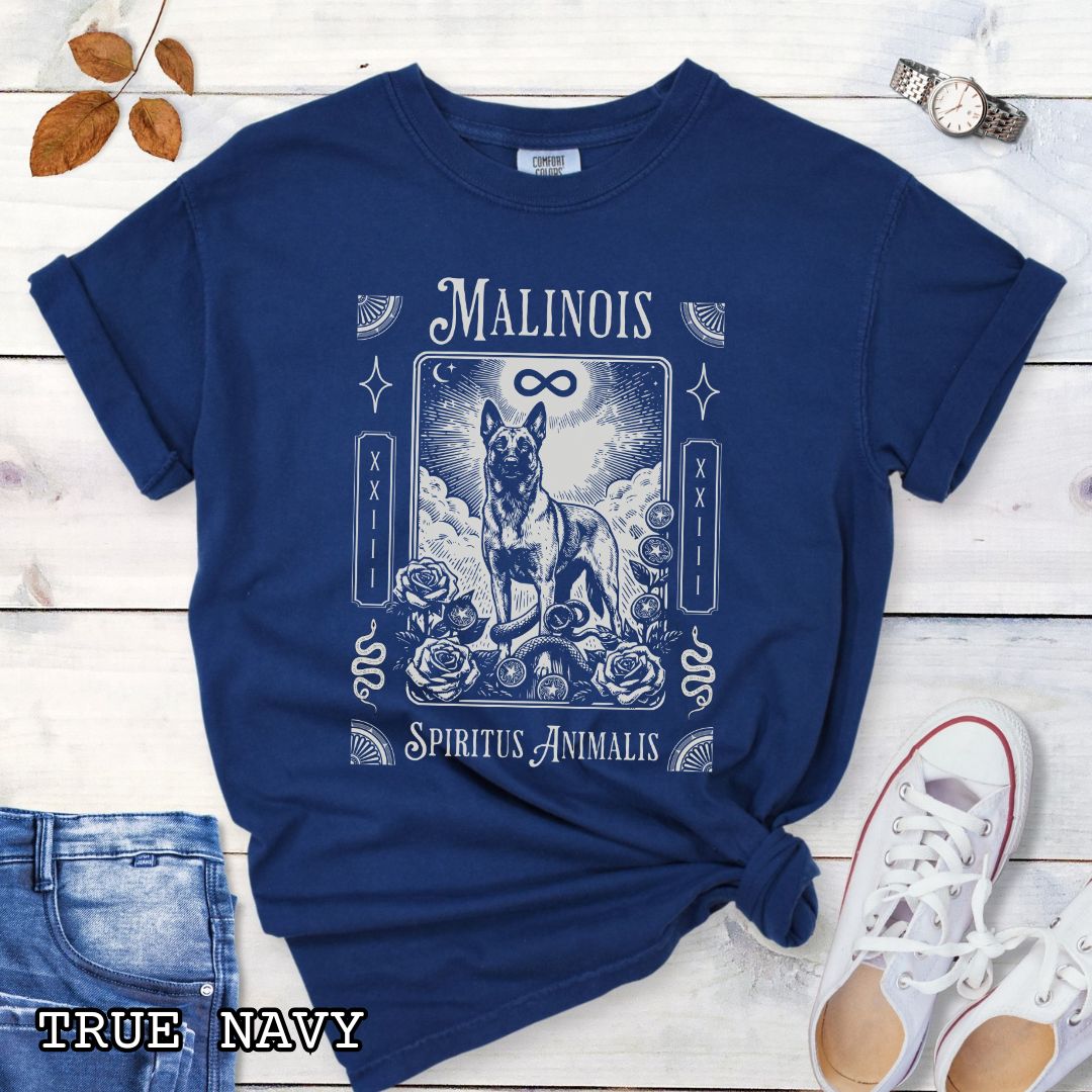 Navy blue Comfort Colors t-shirt featuring a Belgian Malinois tarot card design with Gothic roses and mystical symbols,  and the text 'MALINOIS' and 'SPIRITUS ANIMALIS', perfect for dog lovers and dark aesthetic Malinois fans.