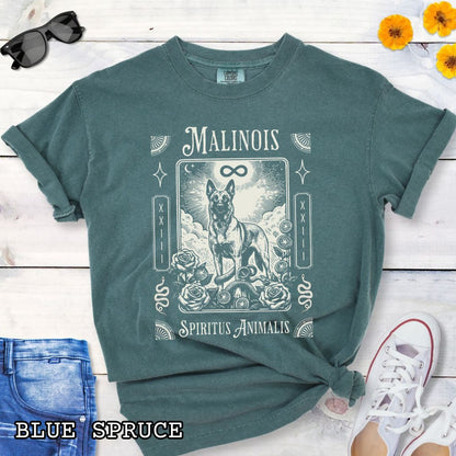 Green Comfort Colors t-shirt featuring a Belgian Malinois tarot card design with Gothic roses and mystical symbols,  and the text 'MALINOIS' and 'SPIRITUS ANIMALIS', perfect for dog lovers and dark aesthetic Malinois fans.