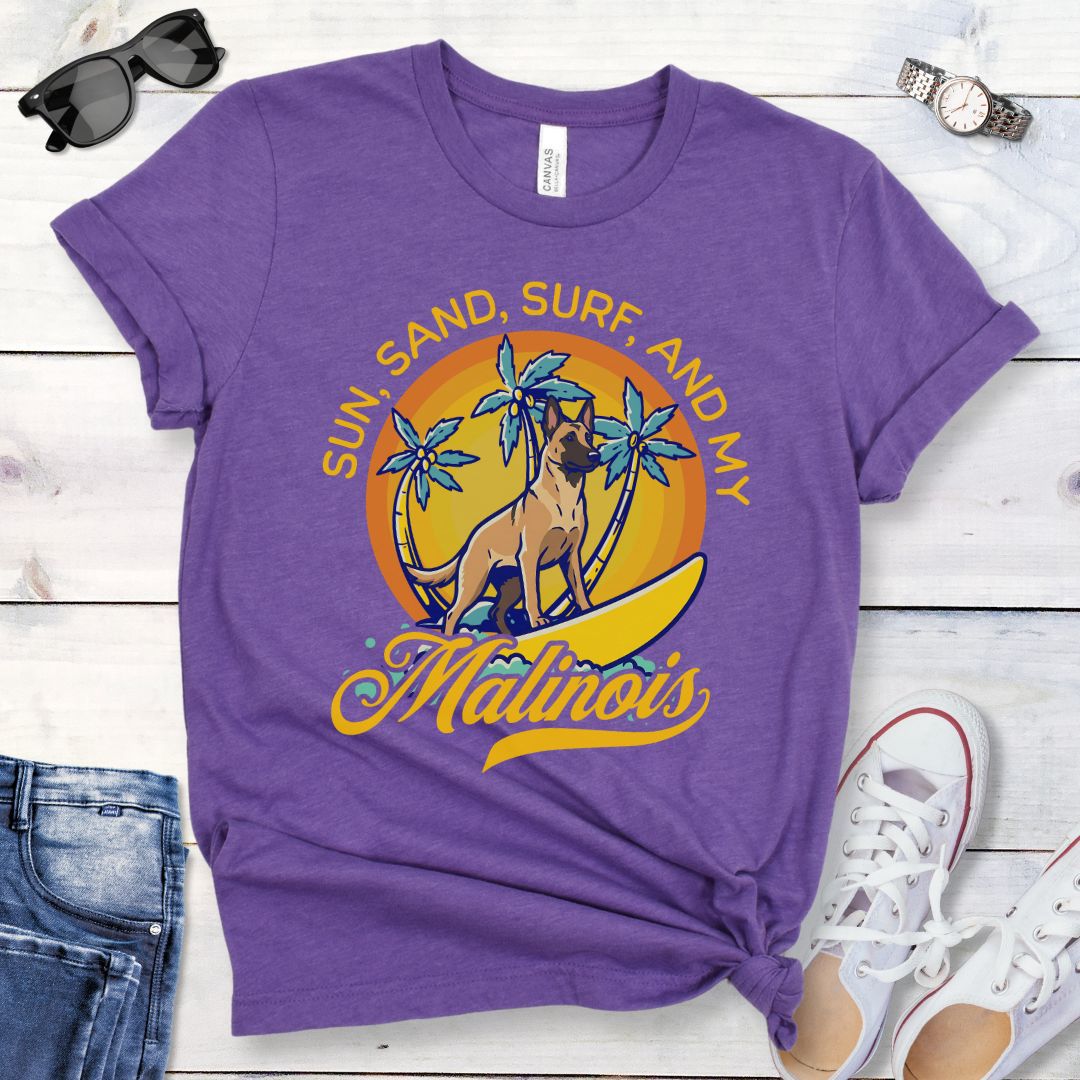 Purple unisex retro tropical Belgian Malinois beach t-shirt featuring a surfing Malinois with palm trees and sunset design, perfect for Malinois owners, working dog lovers, beach dog moms, and summer adventure fans.