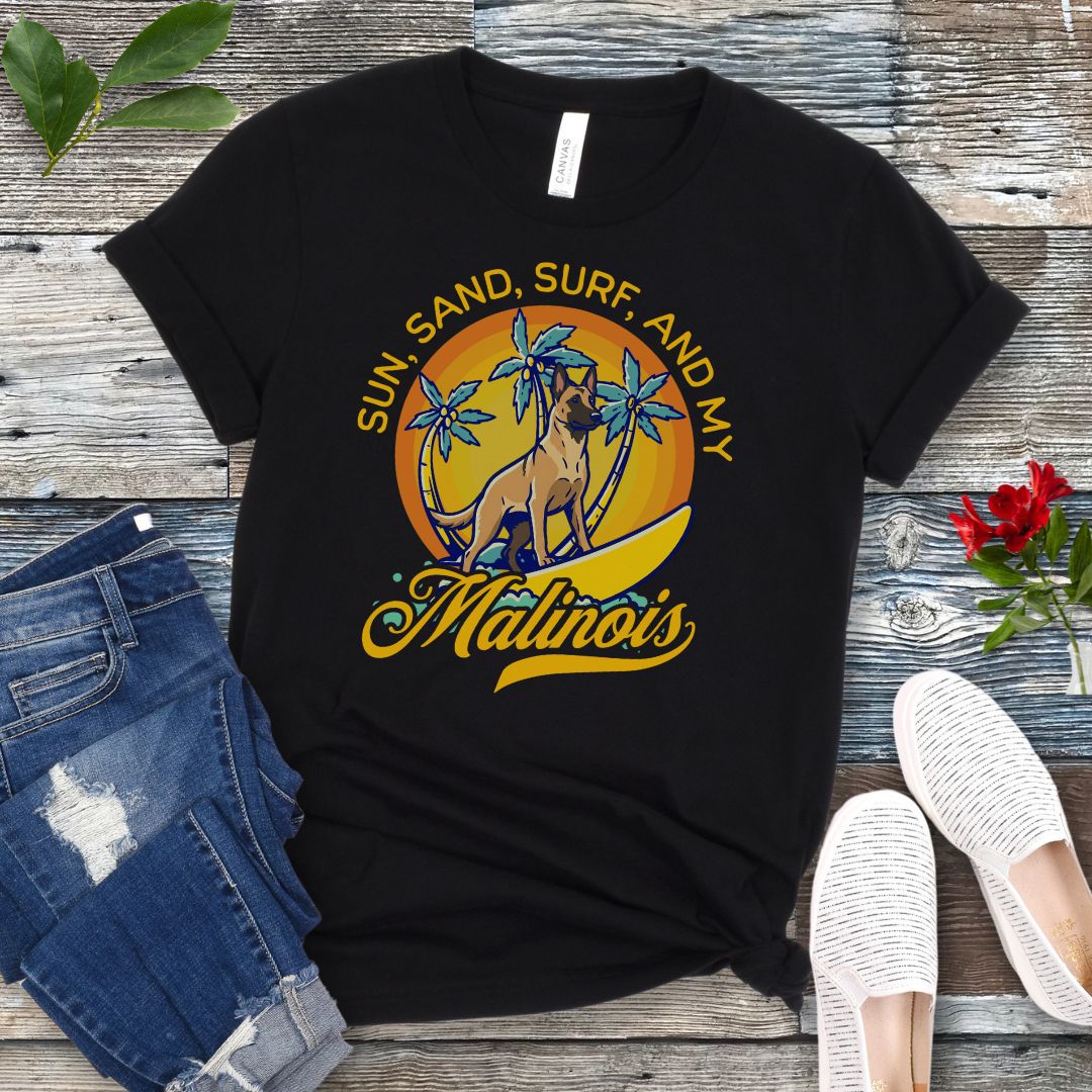 Black unisex retro tropical Belgian Malinois beach t-shirt featuring a surfing Malinois with palm trees and sunset design, perfect for Malinois owners, working dog lovers, beach dog moms, and summer adventure fans.