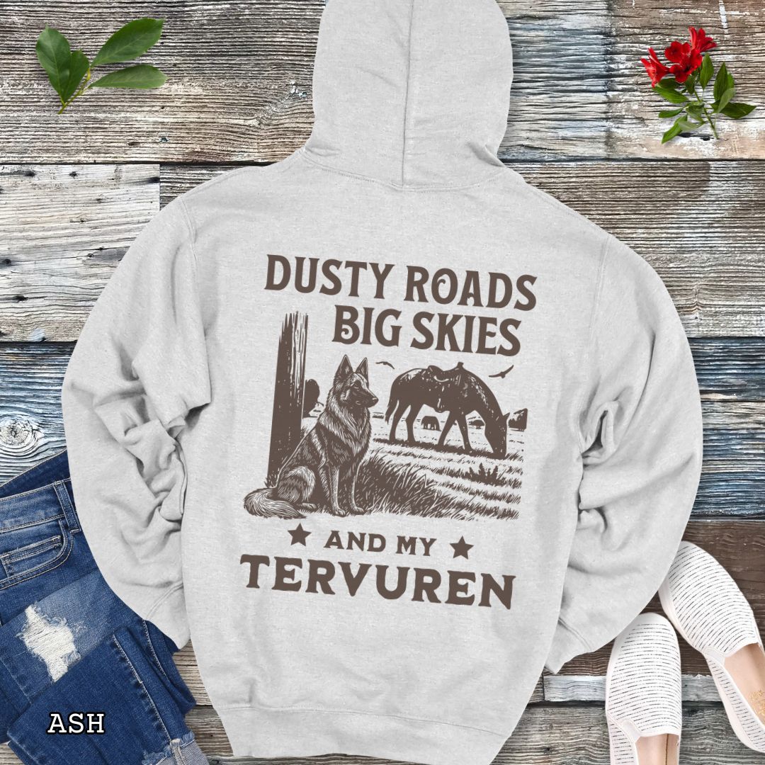 Back view of ash gray hoodie featuring a Western-style design with grazing horse, rustic fence, and a Belgian Tervuren illustration; text reads “Dusty Roads, Big Skies, and My Tervuren.”