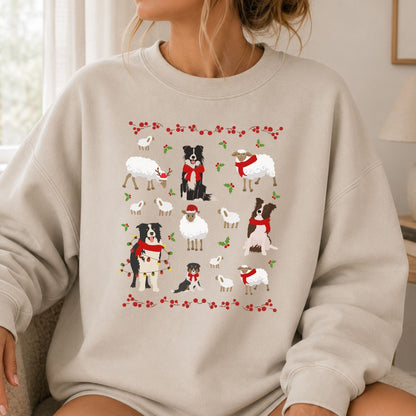 Person wearing sand Gildan 18000 Border Collies and Sheep Christmas sweatshirt featuring festive sheep, Border Collies, Santa hats, scarves, and holly for herding dog lovers.