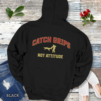Black Schutzhund/IGP hoodie with bitework graphic and 'Catch Grips Not Attitude' text in college style lettering on the back.