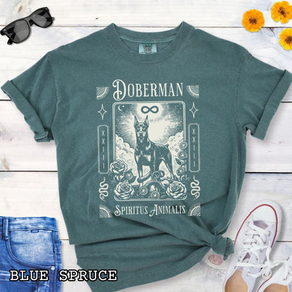 Green Comfort Colors t-shirt featuring a Doberman Pinscher tarot card design with Gothic roses and mystical symbols, perfect for Goth dog lovers and dark aesthetic Doberman fans.