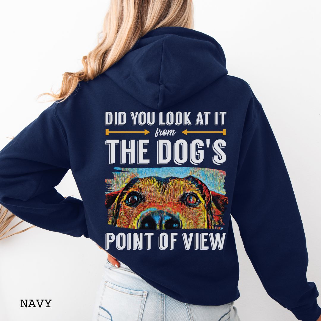 Navy dog lover hoodie with colorful dog face graphic and the text 'Did You Look At It From Your Dog's Point of View' on the back, laid flat with jeans and white shoes.