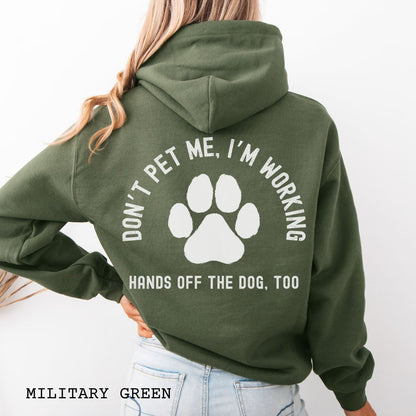Military green back print hoodie with the text 'DON'T PET ME, I'M WORKING, HANDS OFF THE DOG, TOO' and a paw print design.