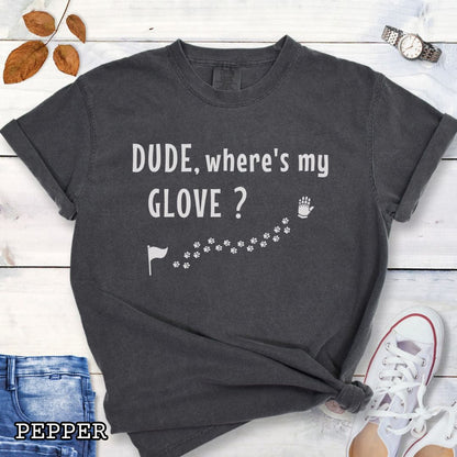 Dark grey tracking dog t-shirt with flag, paw prints, and glove, and the text 'DUDE, where's my GLOVE?', presented on a wooden surface with accessories.