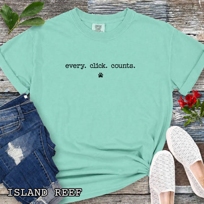 Mint Comfort Colors Every Click Counts t-shirt featuring minimalist typography and paw print design for dog trainers, clicker training enthusiasts, and dog owners.