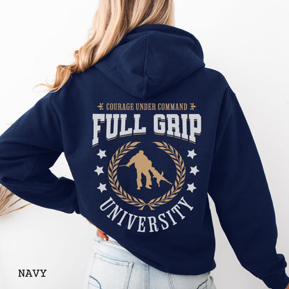 Back view of a navy Schutzhund/IGP hoodie with 'Full Grip University' text , laurels, stars and bite work graphic, worn by a person.