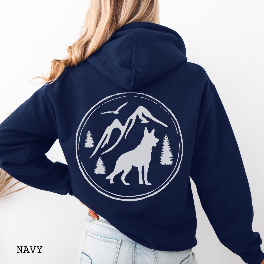 Navy blue Gildan 18500 German Shepherd Mountain Adventure hoodie featuring a large vintage-style back print with GSD silhouette, mountains, pine trees, and birds for hiking and outdoor dog lovers.
