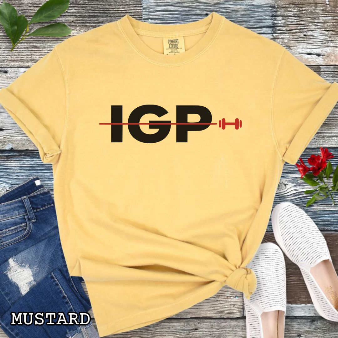 Mustard yellow Comfort Colors t-shirt featuring a bold IGP dumbbell design, perfect for IGP dog sport, Schutzhund, IPO, and working dog training enthusiasts.