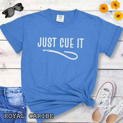 Royal blue Comfort Colors t-shirt featuring a Just Cue It text with leash graphic, a positive reinforcement dog training shirt for dog trainers and reward-based training enthusiasts.
