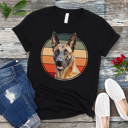 Black t-shirt for Belgian Malinois lovers with a vintage sunset graphic and Malinois face, shown on a wooden surface with jeans and shoes.
