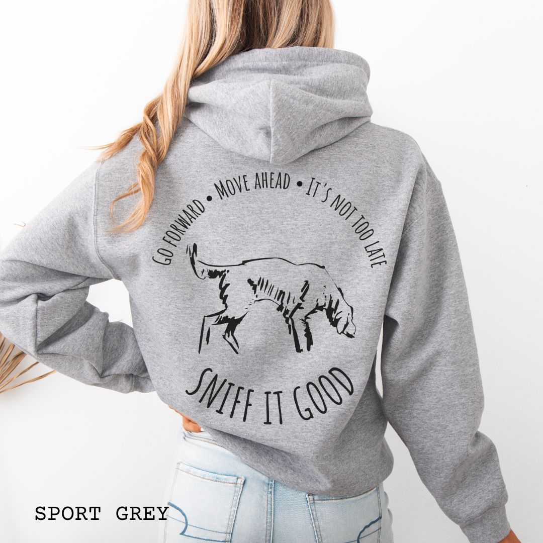 Grey scent work hoodie, seen from the back, with a graphic print of a dog sniffing and text that reads 'Sniff It Good'. 