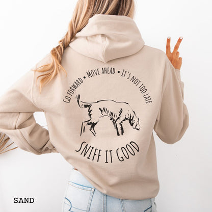 Beige scent work hoodie, seen from the back, with a graphic print of a dog sniffing and text that reads 'Sniff It Good'. 