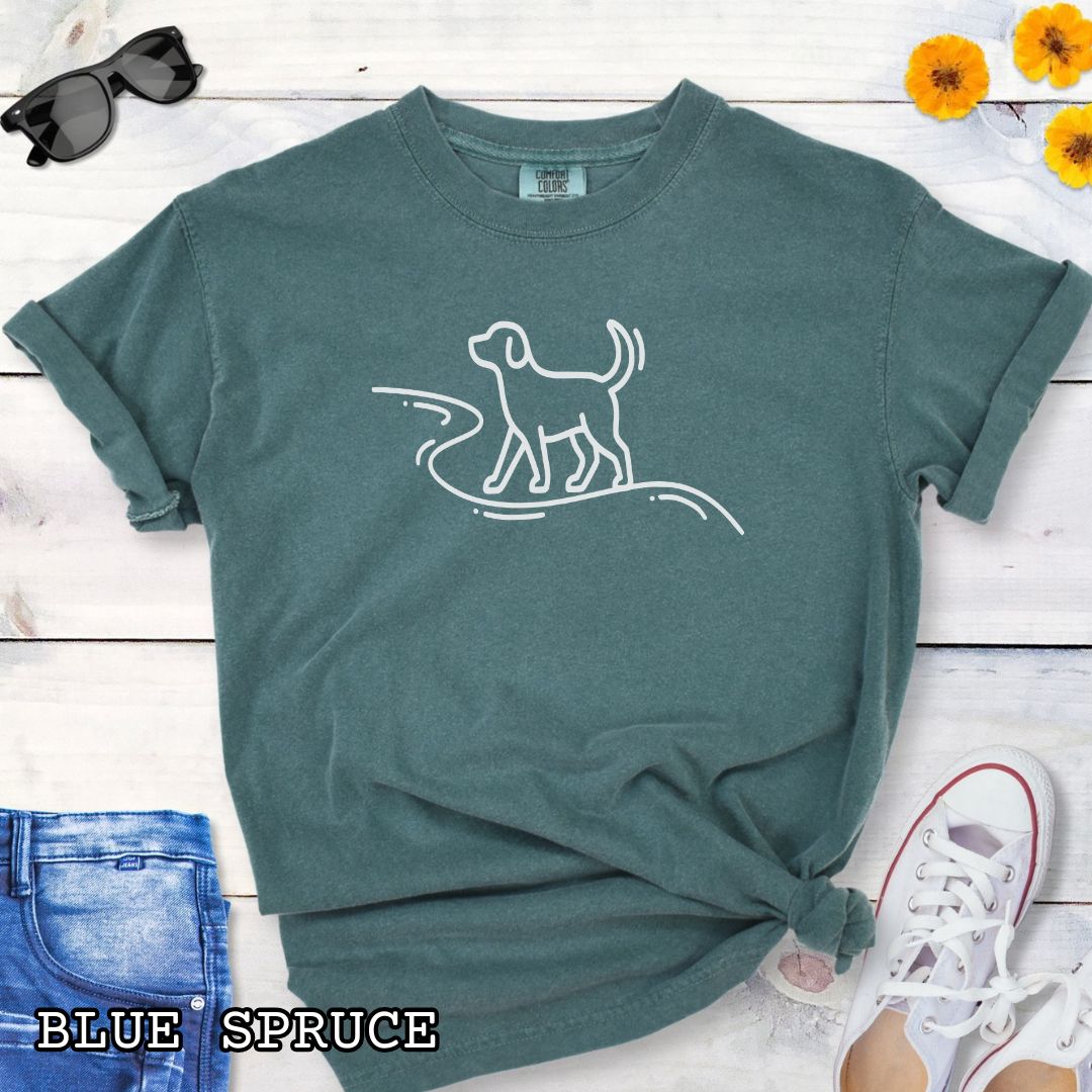 Blue Spruce Comfort Colors t-shirt featuring minimalist dog walking line art, perfect for dog hikers, outdoor dog lovers, and hiking with dogs enthusiasts.