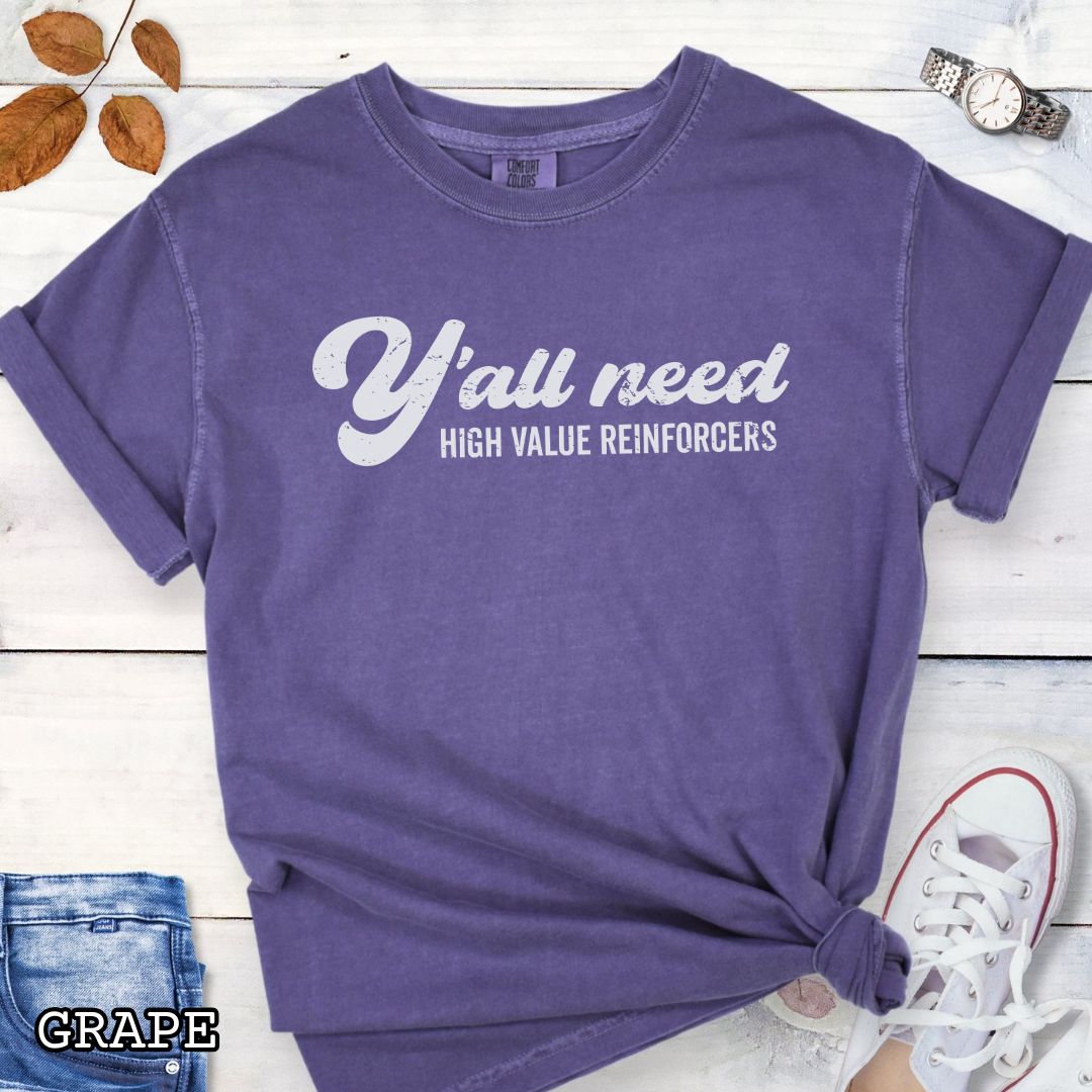 Purple Comfort Colors Y’all Need High Value Reinforcers t-shirt featuring a funny dog training design for positive reinforcement trainers and dog training enthusiasts.